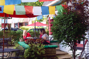 The outdoor seating area at Little Tibet Restaurant in Bloomington has Tibetan prayer flags flying overhead. Little Tibet Restaurant in Bloomington.