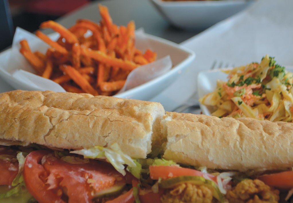 Fried oyster po' boy at B's Po Boy: Fried oyster po' boy, sweet potato fries and Creole cole slaw at B's Po Boy.