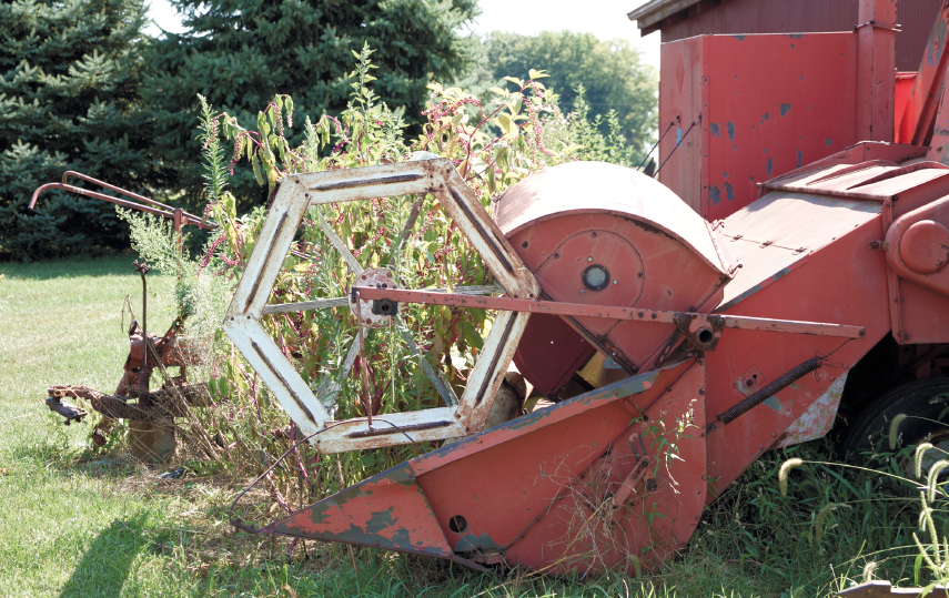 Harvester: The first two years that Anna and Keith Welch grew and harvested flax and small grains, they used this harvester, which is like a combine that runs behind a tractor.