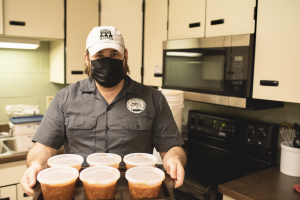 Photograph by Torrie Hudson Ross Katz serves chili at No Questions asked Food Pantry